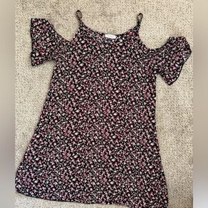 Black and rose print dress with cutout shoulders.